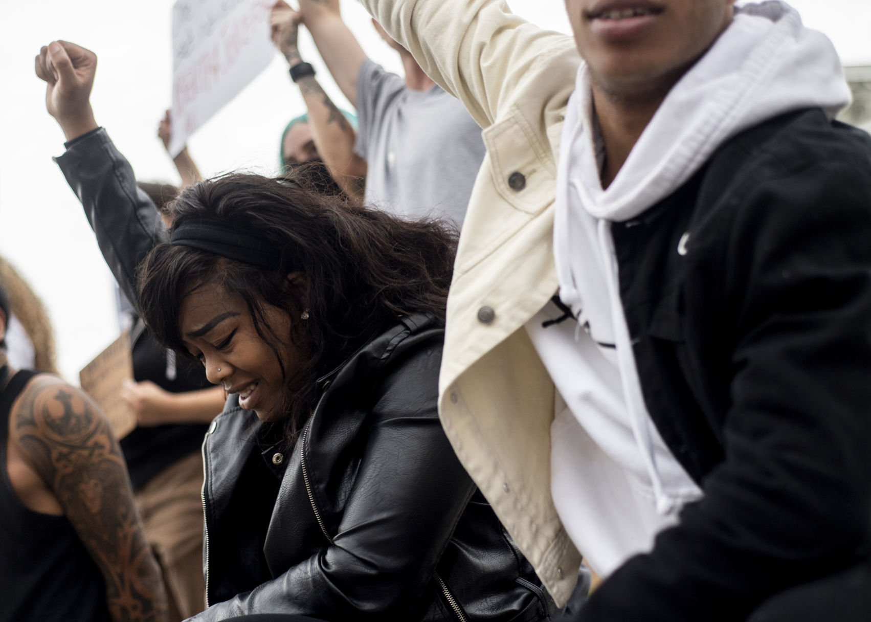 Sania Simpson holds her fist in the air